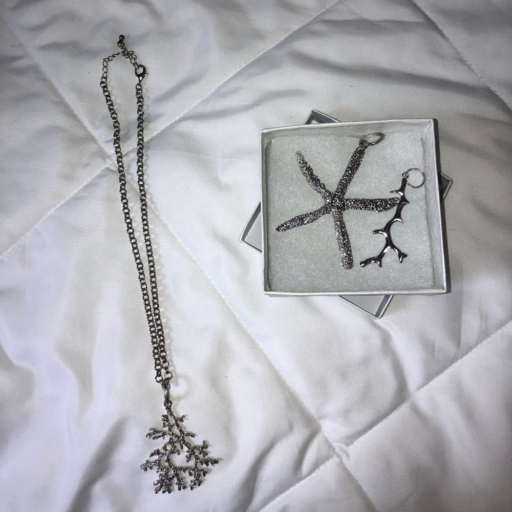 Silver chain with 3 nautical charms, never worn.